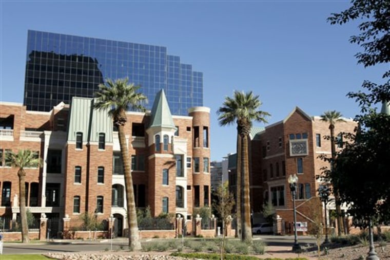 Chateau on Central is modeled on a turreted 1890s-era mansion in Phoenix. The luxury 21-unit project just north of downtown was halted in mid-development. More than five years after construction began, a new investor is putting the townhomes on the market.
